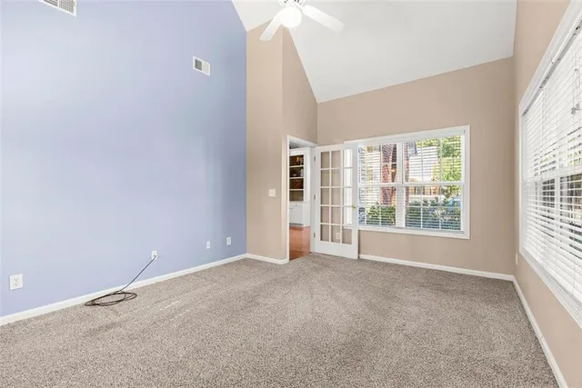 an empty room with windows