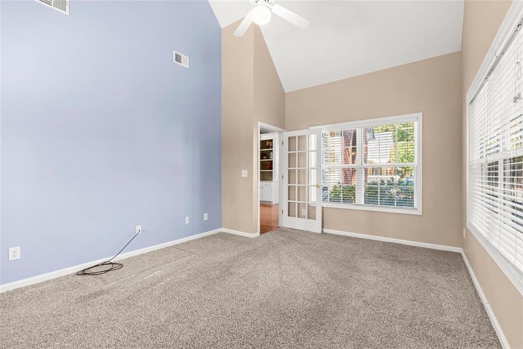 1225 Creek Forest Lane Austell, GA 30106 - Photo 20 of 32 an empty room with windows