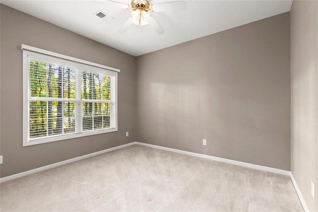 1225 Creek Forest Lane Austell, GA 30106 - Photo 24 of 32 a view of an empty room with a window