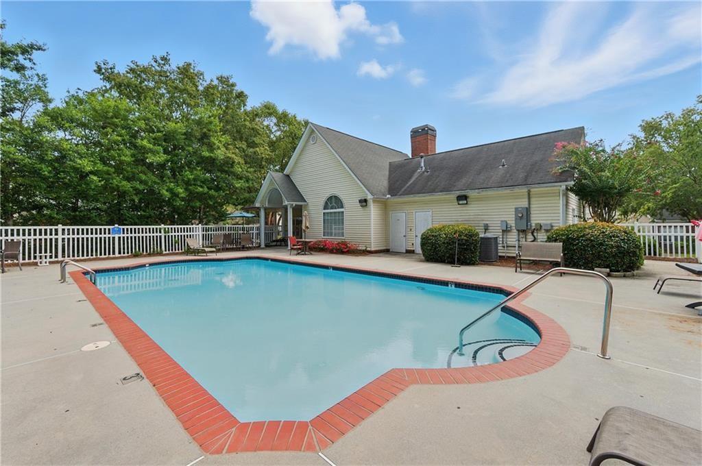 1225 Creek Forest Lane Austell, GA 30106 - Photo 31 of 32 a view of a house with pool