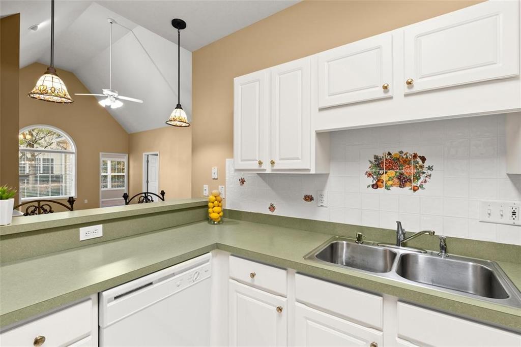 1225 Creek Forest Lane Austell, GA 30106 - Photo 10 of 32 a kitchen with a sink and cabinets