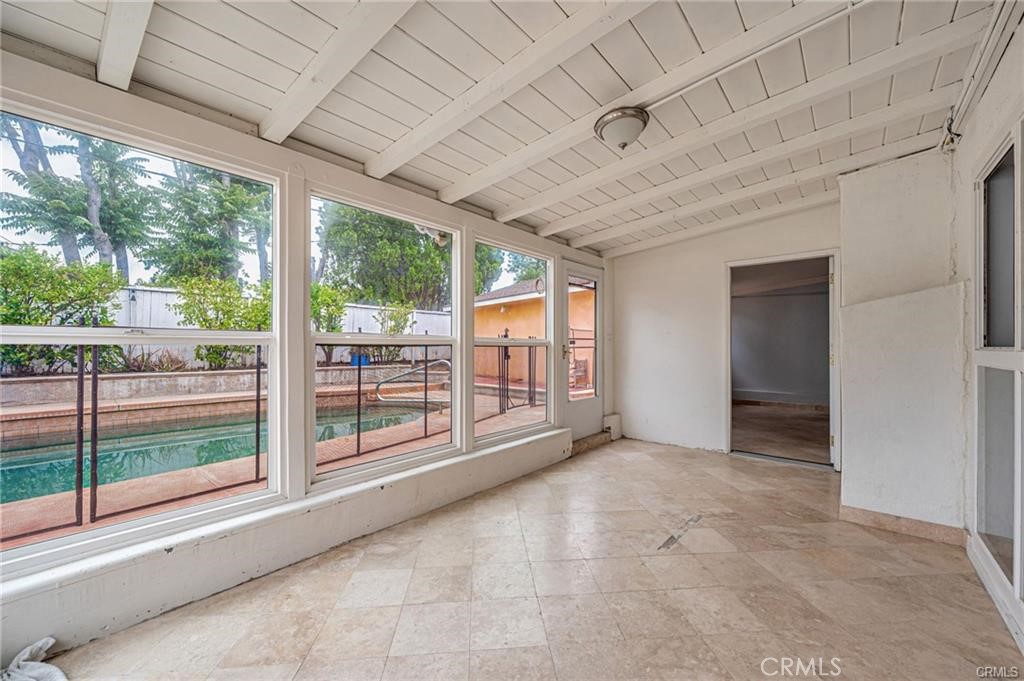 20129 Halsted Street Chatsworth, CA 91311 - Photo 27 of 31 a view of an empty room with windows and roof