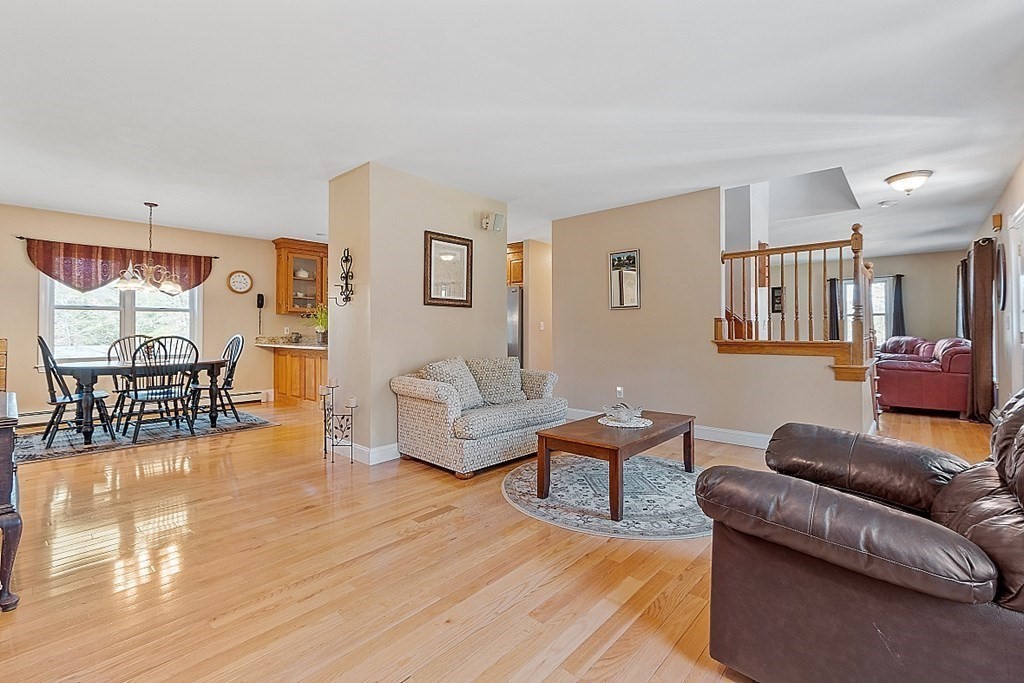 258 West Road Ashby, MA 01431 - Photo 15 of 42 a living room with furniture and a wooden floor