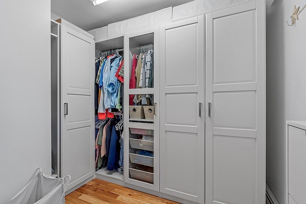 258 West Road Ashby, MA 01431 - Photo 18 of 42 a view of walk in closet with clothes