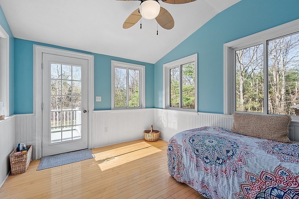 258 West Road Ashby, MA 01431 - Photo 24 of 42 a bedroom with a large bed and a large window