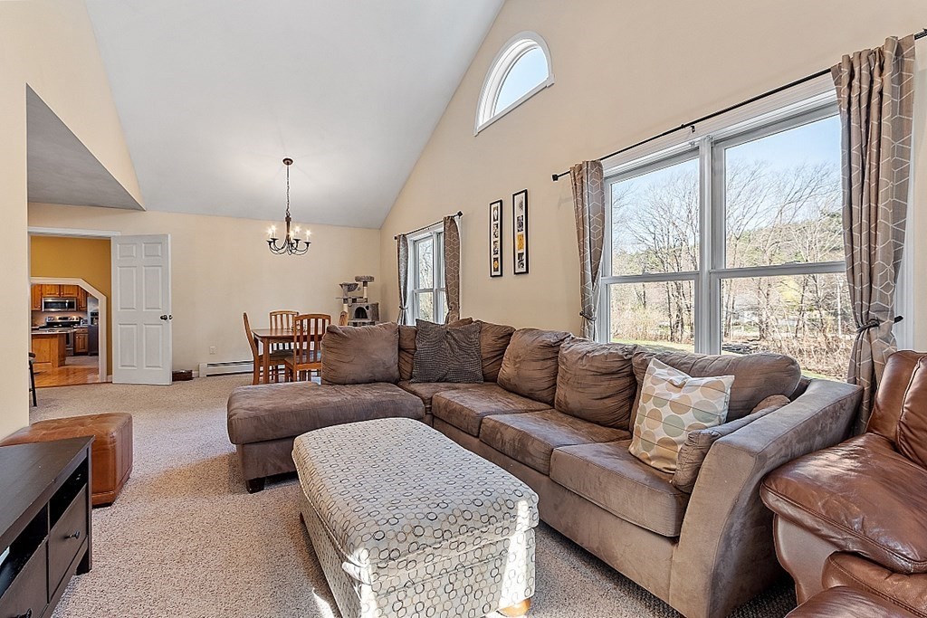 258 West Road Ashby, MA 01431 - Photo 27 of 42 a living room with furniture and a large window