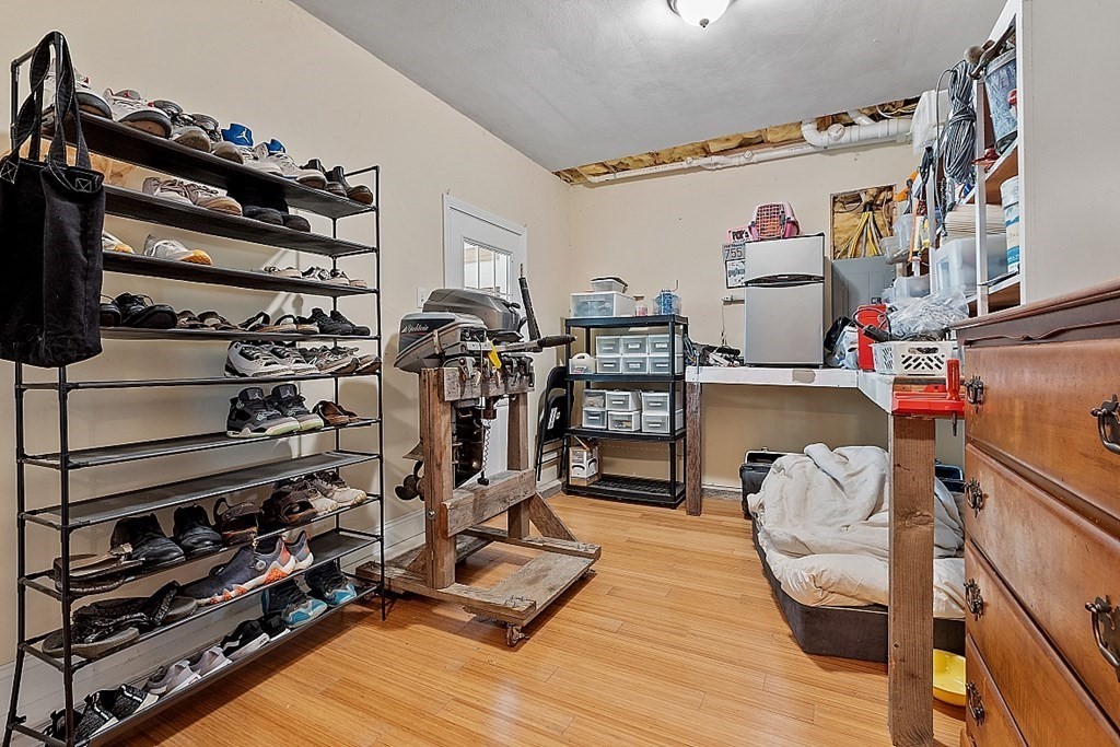 258 West Road Ashby, MA 01431 - Photo 32 of 42 a view of walk in closet with clothes and shoes