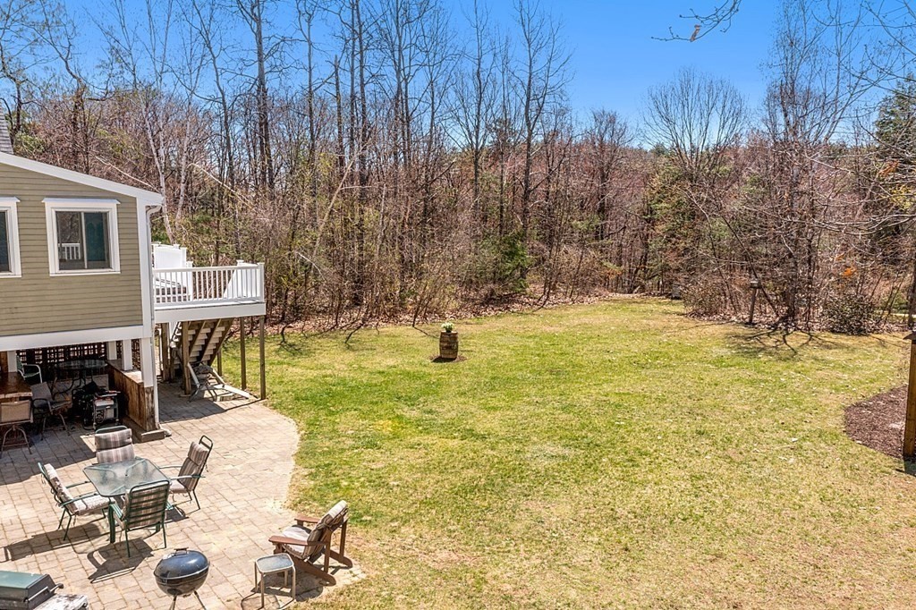 258 West Road Ashby, MA 01431 - Photo 35 of 42 a view of swimming pool with lawn chairs and wooden fence