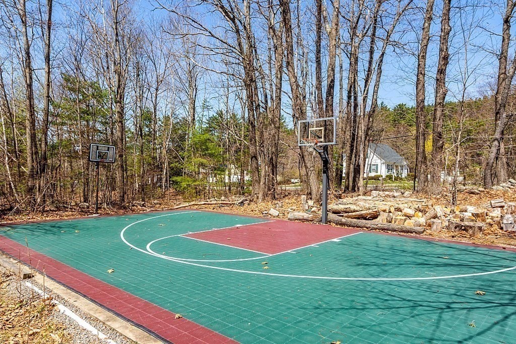 258 West Road Ashby, MA 01431 - Photo 38 of 42 a view of a playground with basketball court