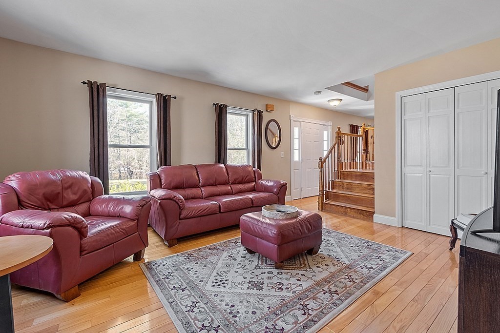 258 West Road Ashby, MA 01431 - Photo 4 of 42 a living room with furniture and a rug