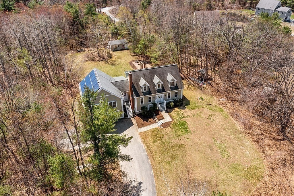 258 West Road Ashby, MA 01431 - Photo 41 of 42 an aerial view of a house with a yard