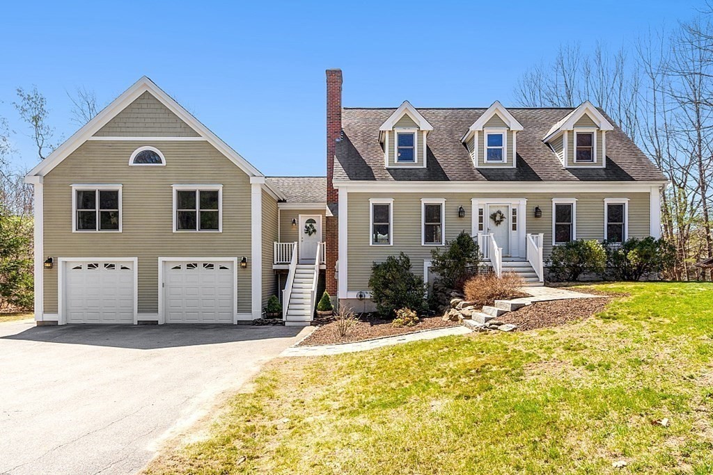 258 West Road Ashby, MA 01431 - Photo 42 of 42 a front view of a house with a yard