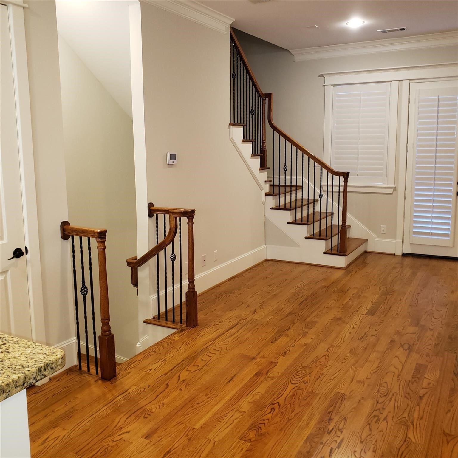 916 Lawrence Street, Unit C Houston, TX 77008 - Photo 6 of 38 a view of entryway with wooden floor