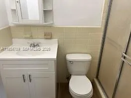 a view of backyard with swimming pool