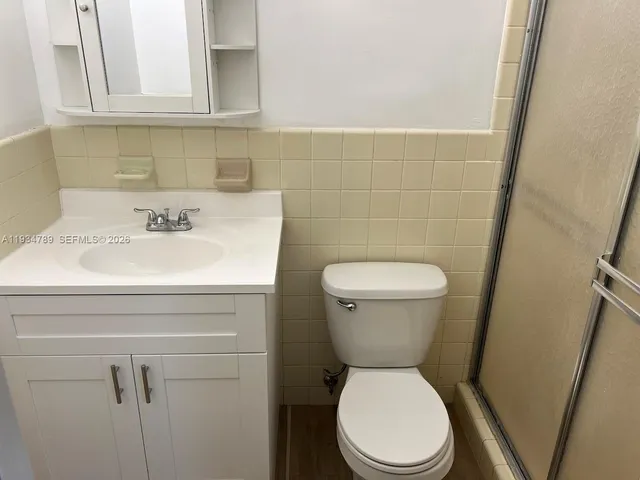 a view of balcony with furniture