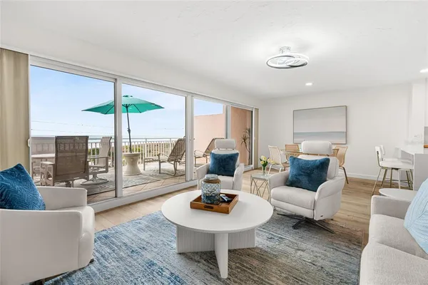 a living room with furniture and a table