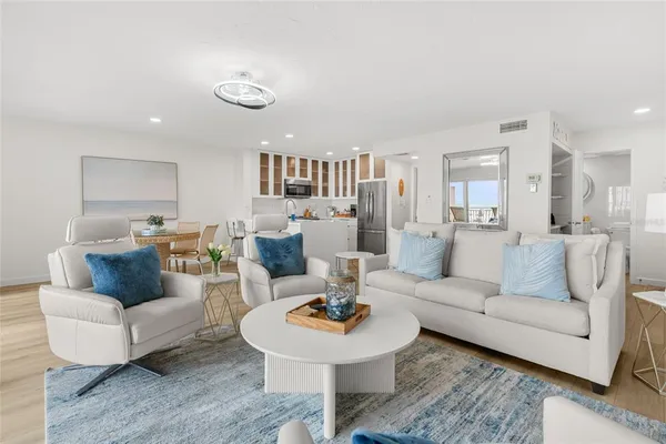a living room with furniture and a table