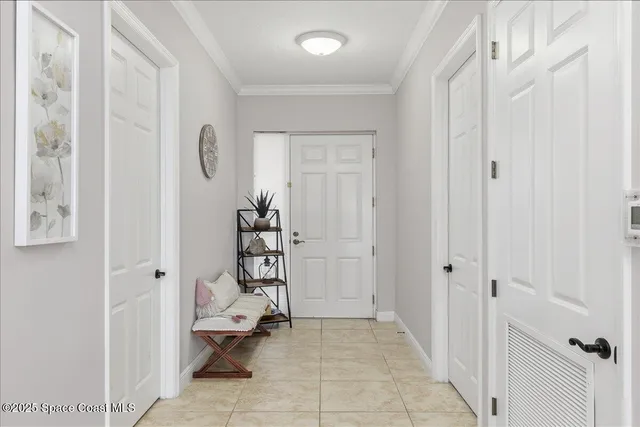 a kitchen with a dining table chairs and view kitchen