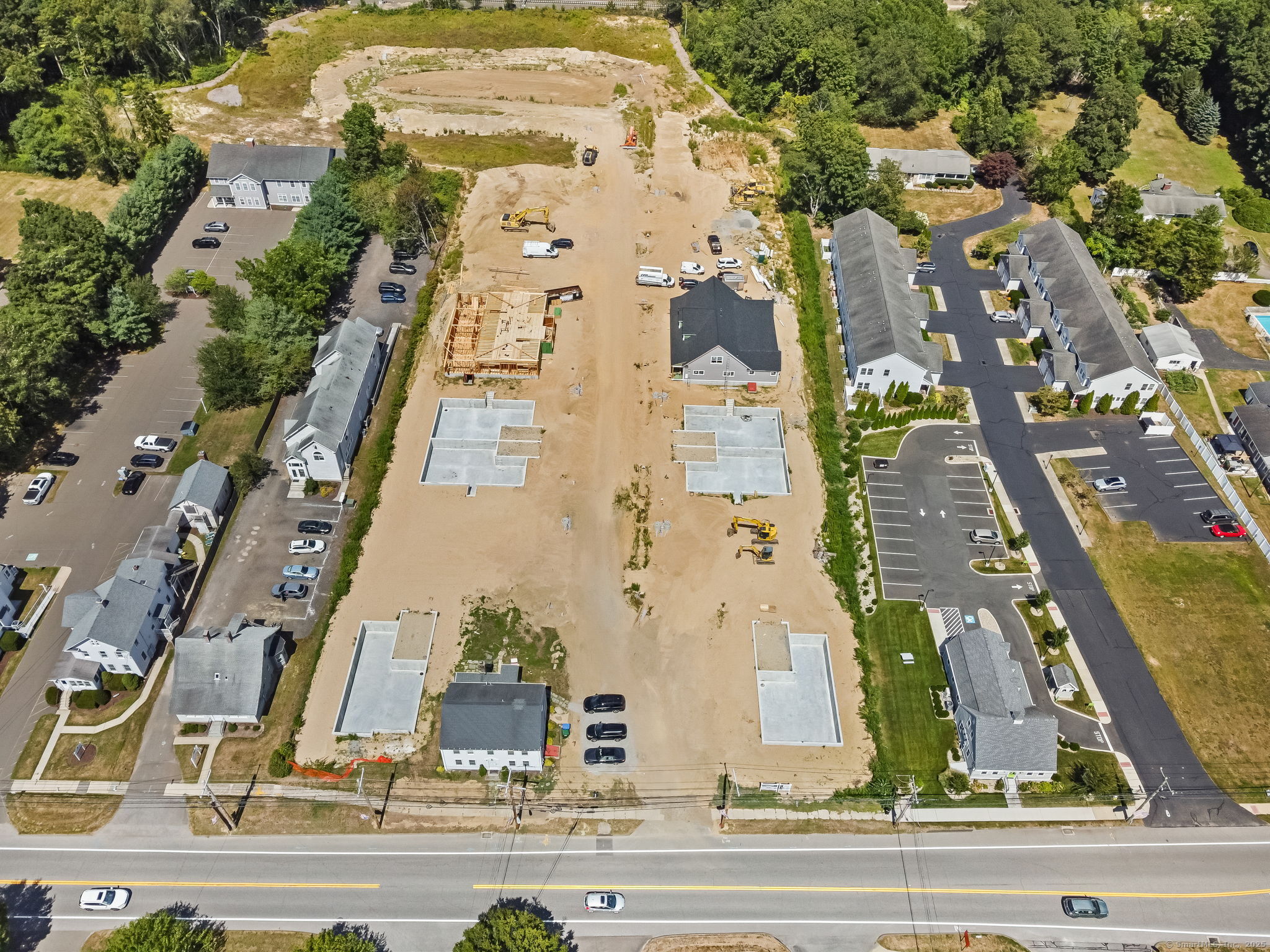 151-153 East Main Street, Unit 19 Clinton, CT 06413 - Photo 34 of 34 an aerial view of a residential building with an outdoor space