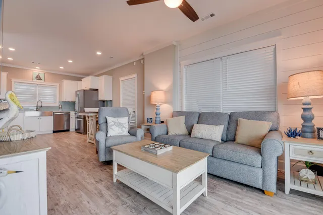 a living room with furniture and a table