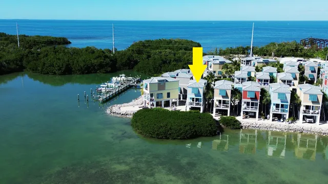 a view of a lake with a building in front of it
