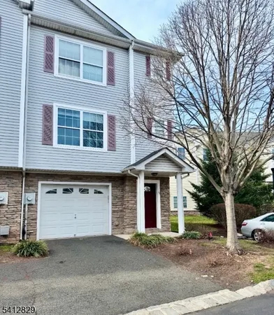 front view of a house with a street