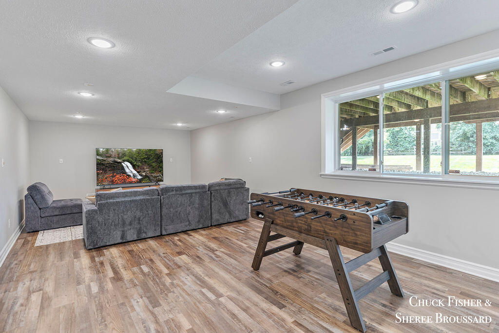 7286 Storey Book Lane Ada, MI 49301 - Photo 45 of 56 Lower Level Living Room
