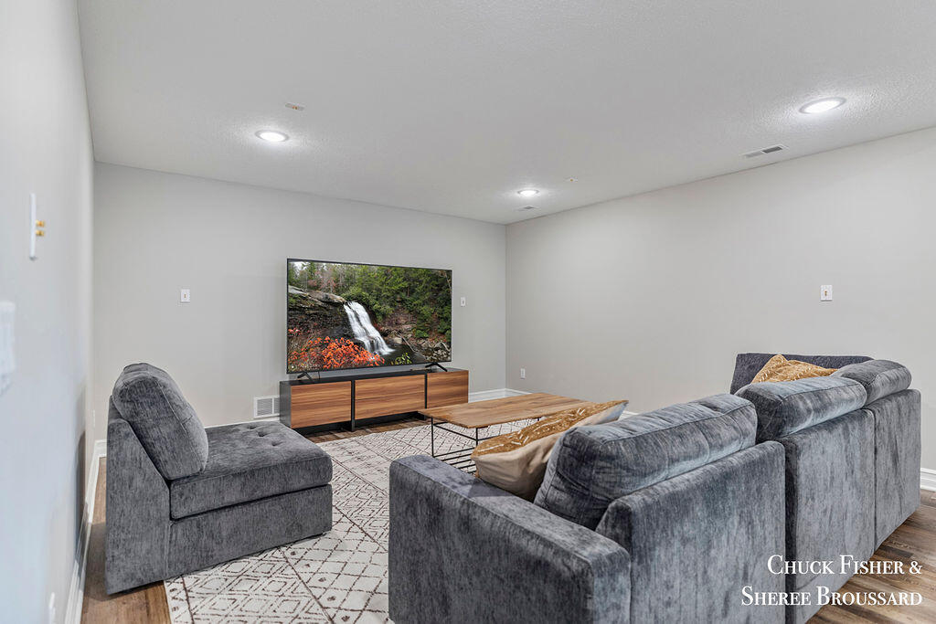 7286 Storey Book Lane Ada, MI 49301 - Photo 46 of 56 Lower Level Living Room