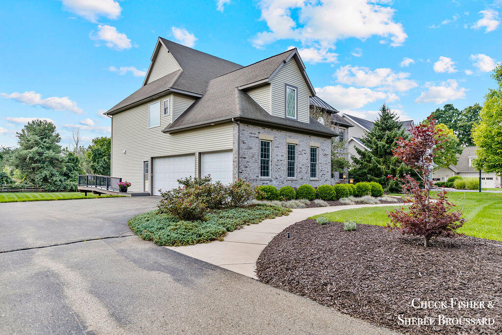 7286 Storey Book Lane Ada, MI 49301 - Photo 6 of 56 Side View