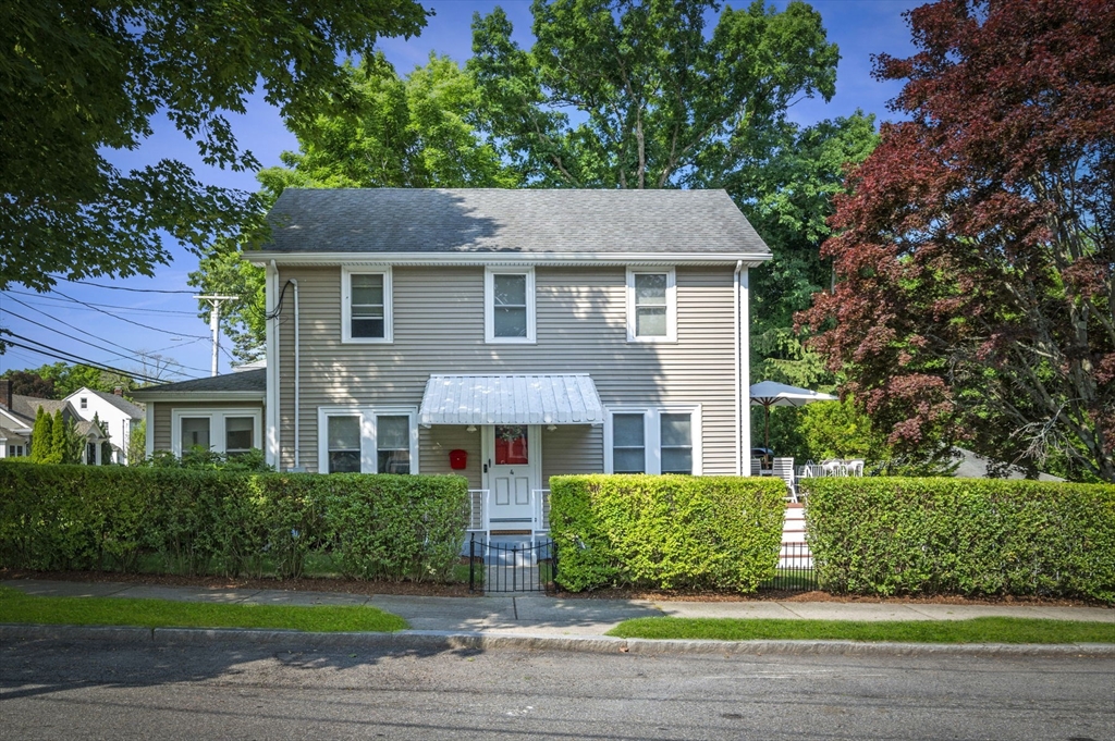4 Edgewood Road Newton, MA 02465 - Photo 1 of 39 a aerial view of a house next to a yard