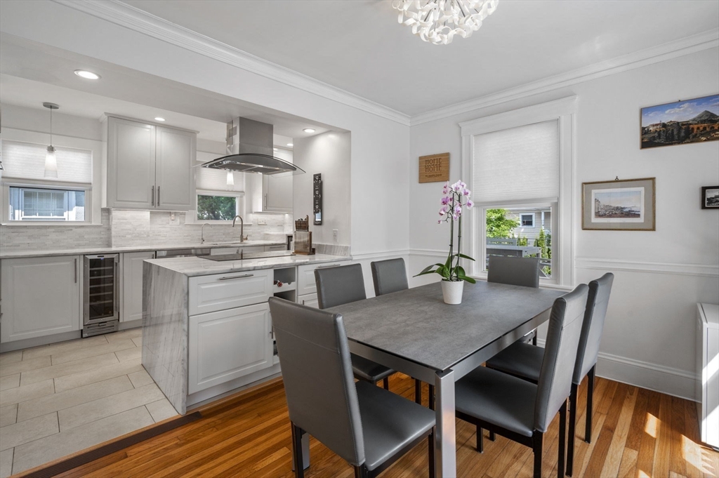 4 Edgewood Road Newton, MA 02465 - Photo 13 of 39 a view of a dining room with furniture and wooden floor