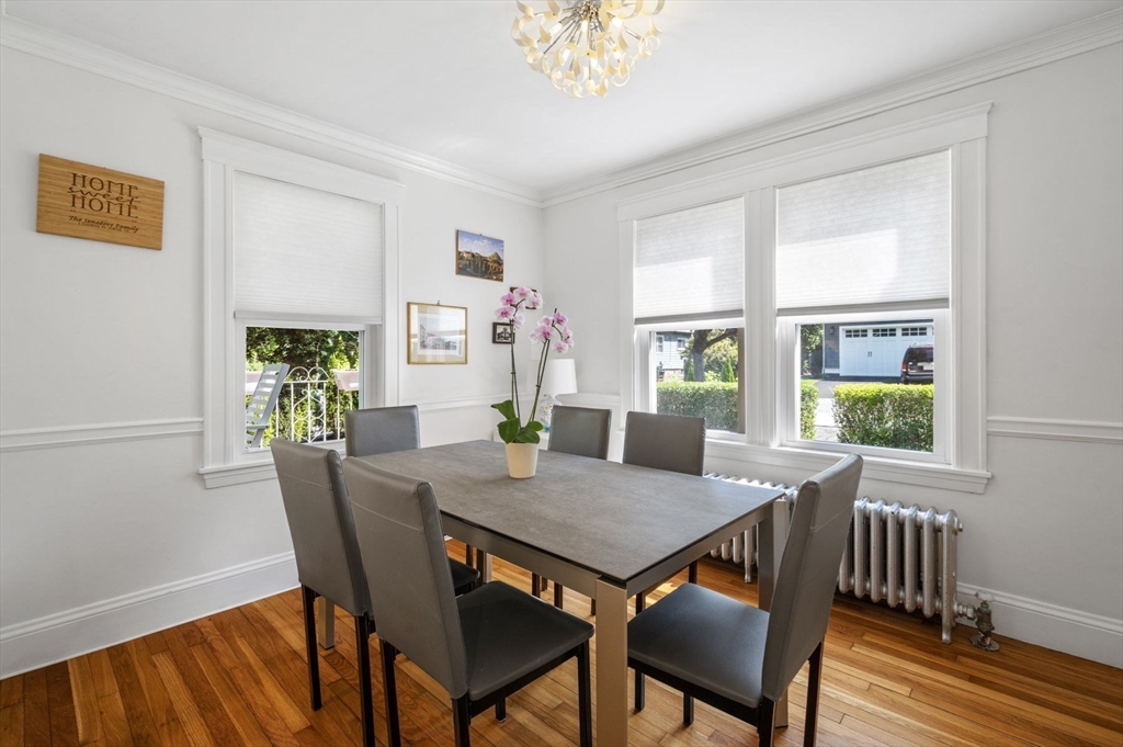 4 Edgewood Road Newton, MA 02465 - Photo 14 of 39 a view of a dining room with furniture window and wooden floor