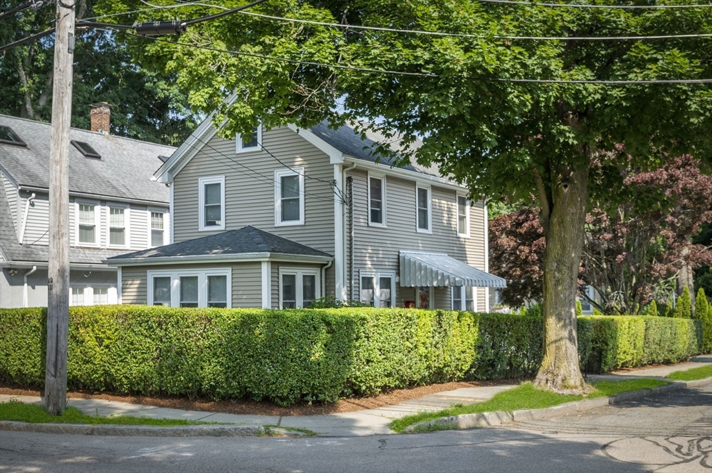 4 Edgewood Road Newton, MA 02465 - Photo 2 of 39 a front view of a house with a yard