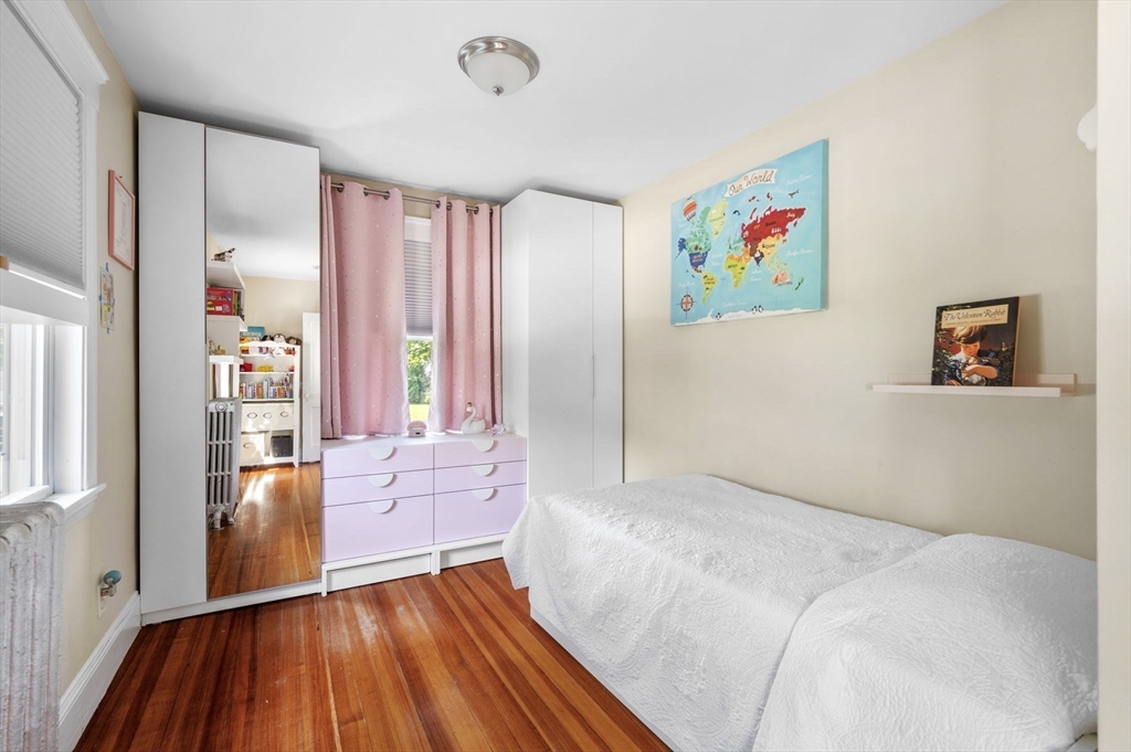 4 Edgewood Road Newton, MA 02465 - Photo 29 of 39 a bedroom with furniture and a large window