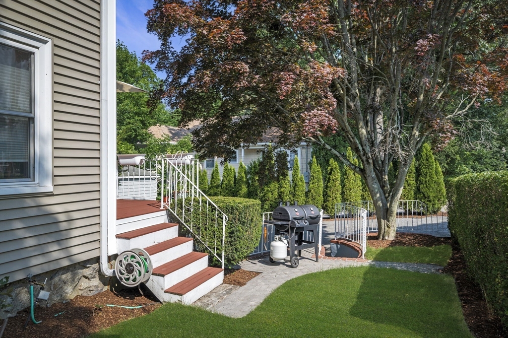 4 Edgewood Road Newton, MA 02465 - Photo 33 of 39 a balcony with chairs and a yard