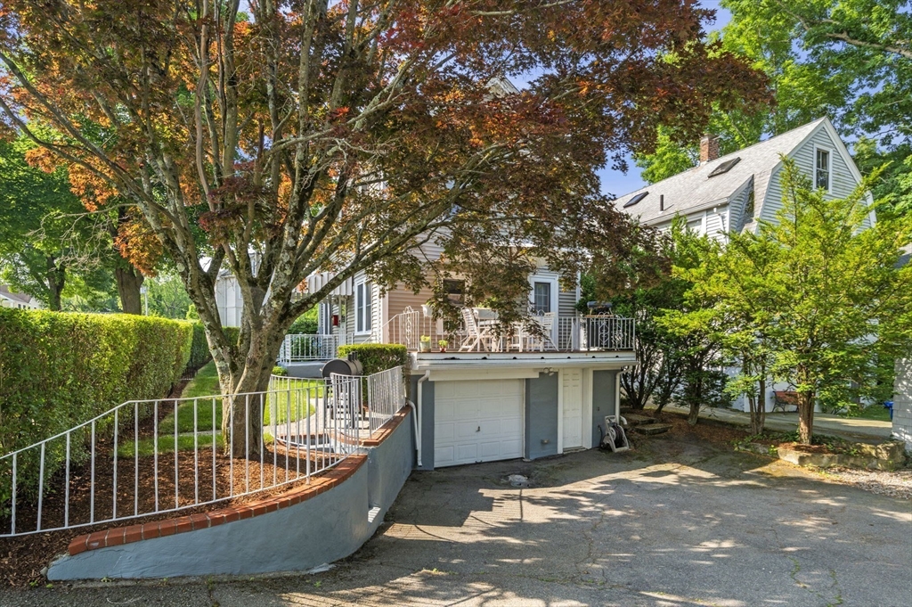 4 Edgewood Road Newton, MA 02465 - Photo 35 of 39 a view of a house with a backyard and a patio