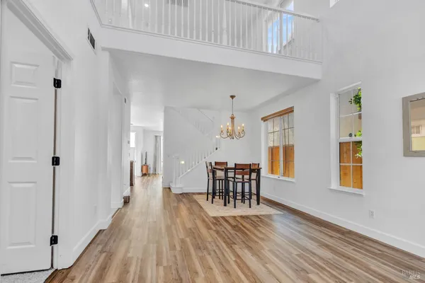 a view of a livingroom with furniture and wooden floor
