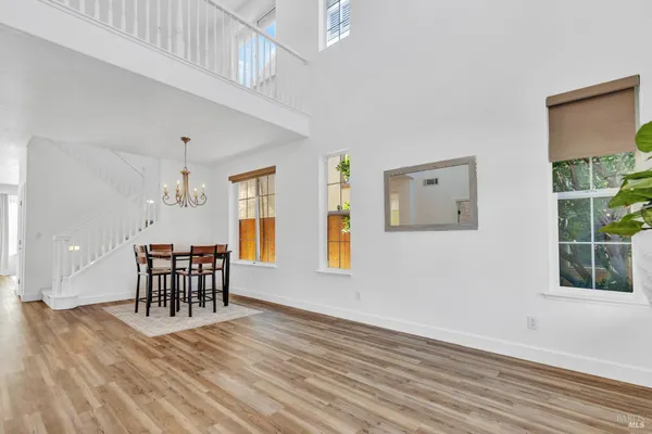 a view of a livingroom with furniture and window