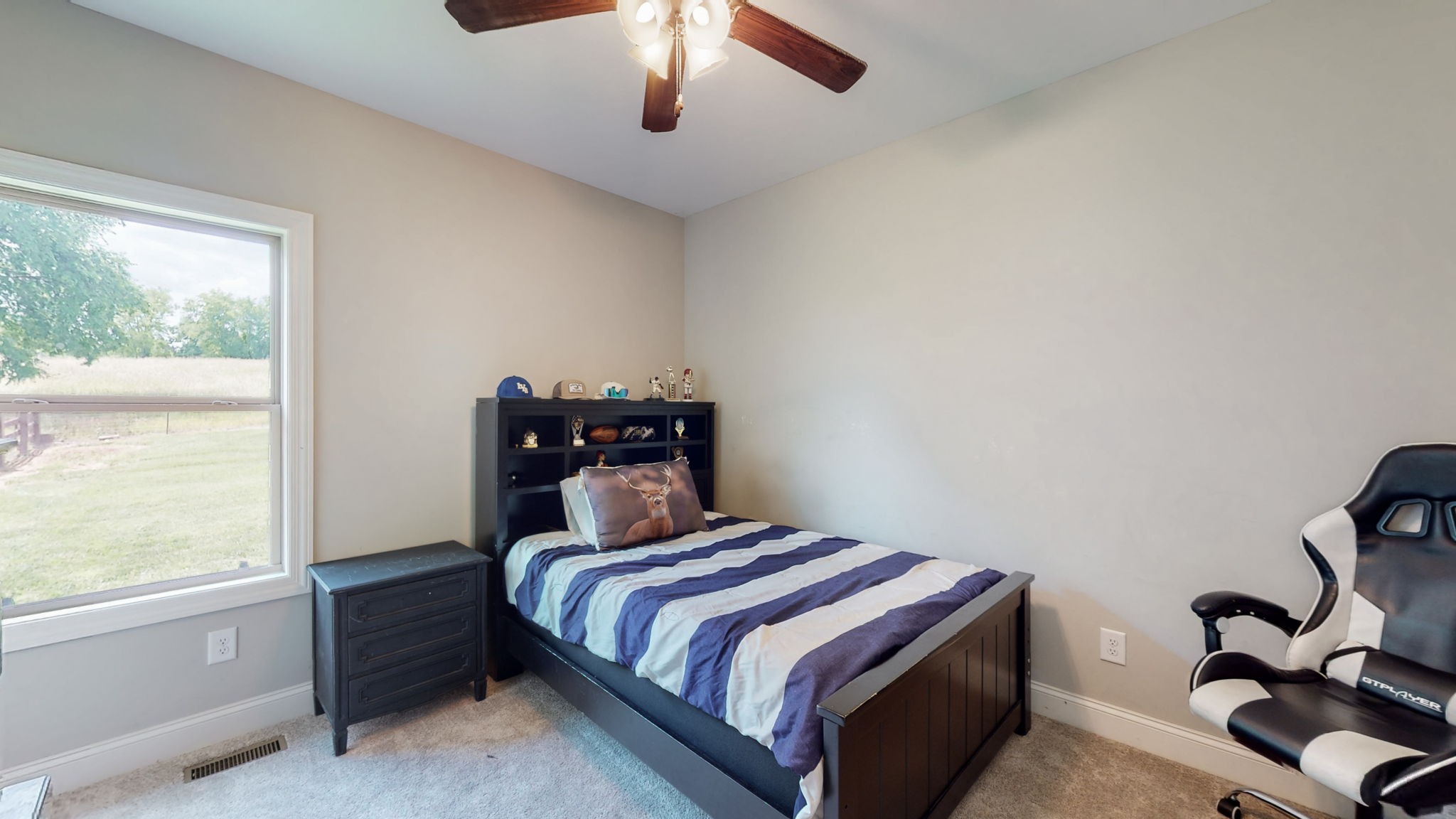 650 Burford Road Lebanon, TN 37087 - Photo 23 of 50 a bedroom with a bed and a window