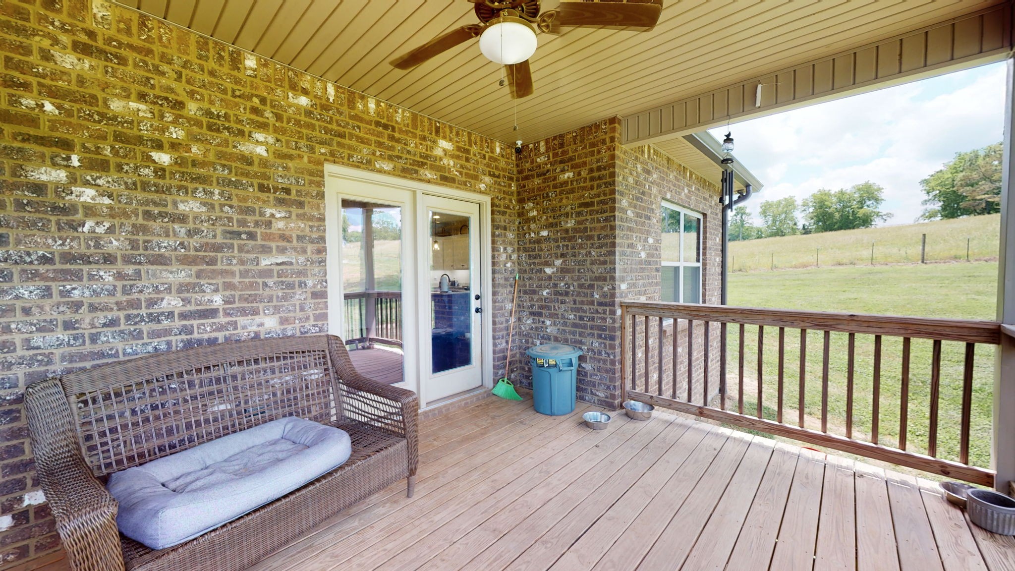 650 Burford Road Lebanon, TN 37087 - Photo 32 of 50 a view of a porch with chairs and wooden floor