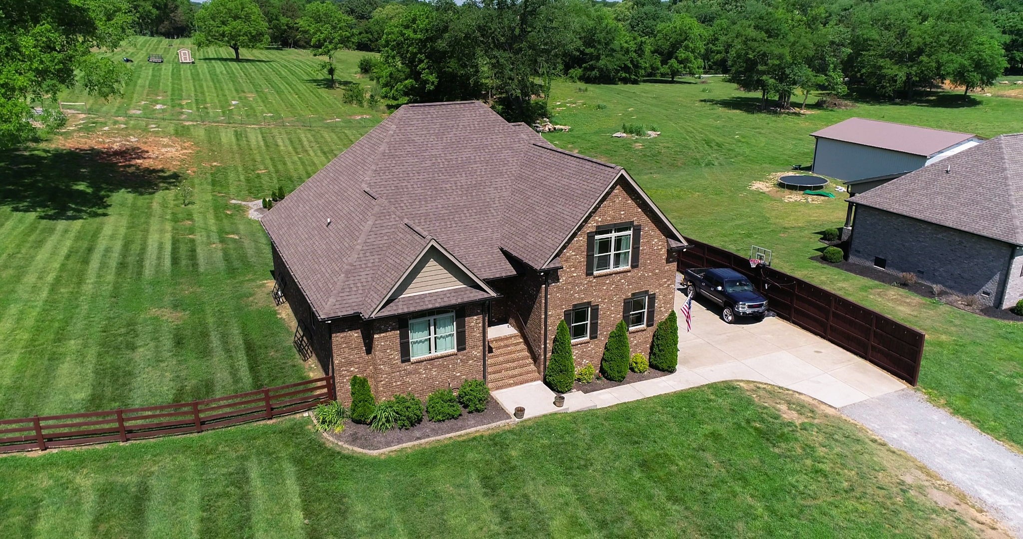 650 Burford Road Lebanon, TN 37087 - Photo 35 of 50 a aerial view of a house next to a big yard and large trees