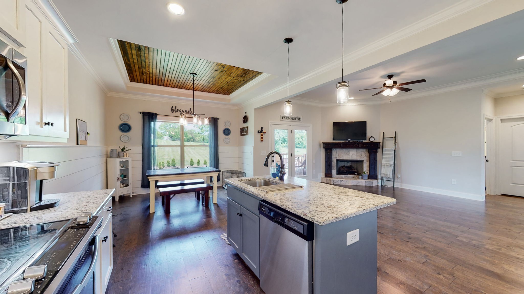 650 Burford Road Lebanon, TN 37087 - Photo 8 of 50 a kitchen with a stove center island a sink cabinets and wooden floor