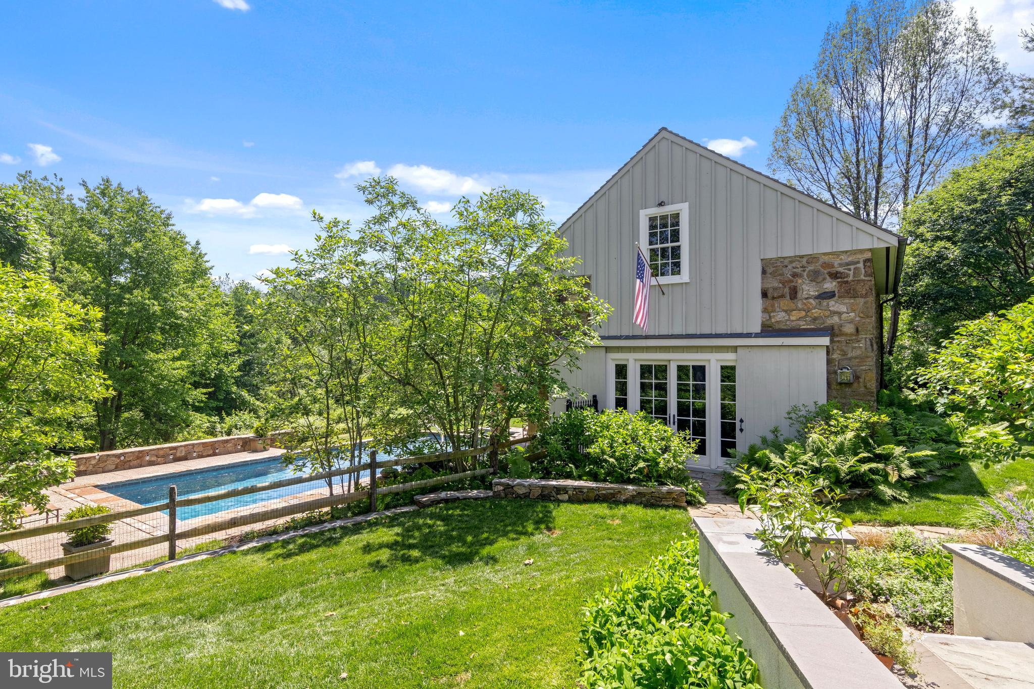105 Brooke Farm Road Wayne, PA 19087 - Photo 7 of 47 View from house to Barn & Pool