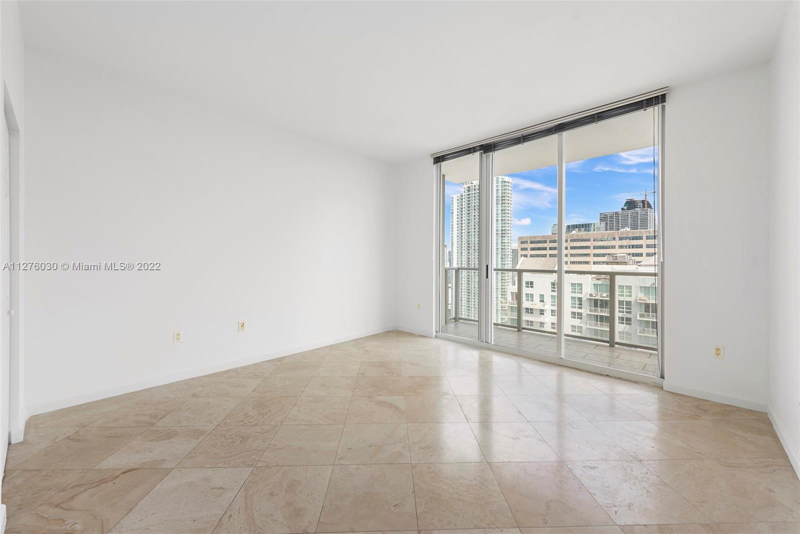 1155 Brickell Bay Drive, Unit PH104 Miami, FL 33131 - Photo 14 of 33 a view of an empty room with a window