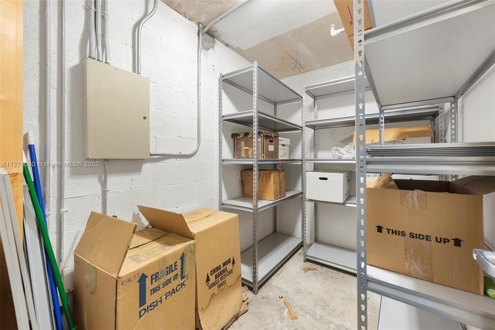 1155 Brickell Bay Drive, Unit PH104 Miami, FL 33131 - Photo 21 of 33 a room with storage and utility