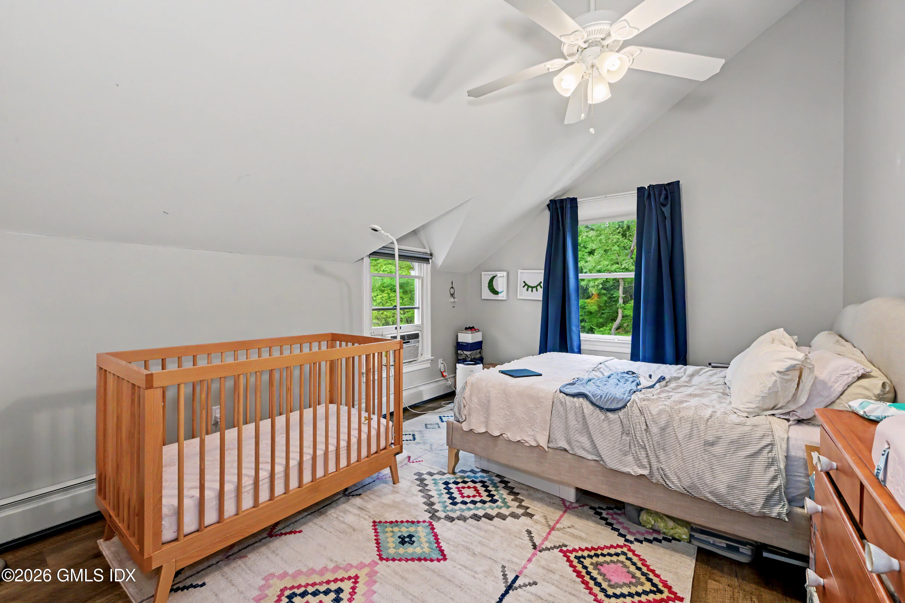 37 Prospect Street Greenwich, CT 06830 - Photo 28 of 41 a bedroom with a bed and a window