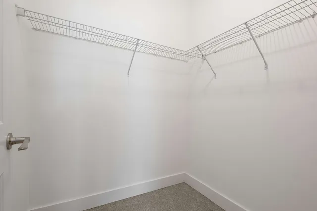 a view of a room with racks on the wall