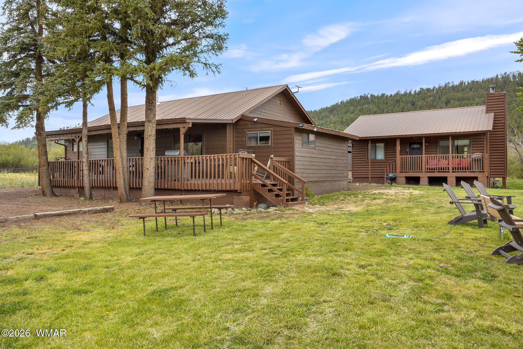 85 Main Street Greer, AZ 85927 - Photo 2 of 55 a view of a house with pool and porch