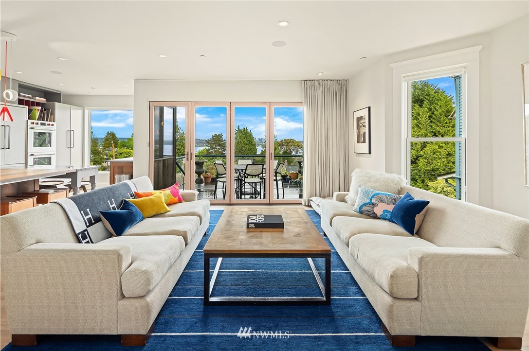 1618 37th Avenue Seattle, WA 98122 - Photo 2 of 39 a living room with furniture and a large window