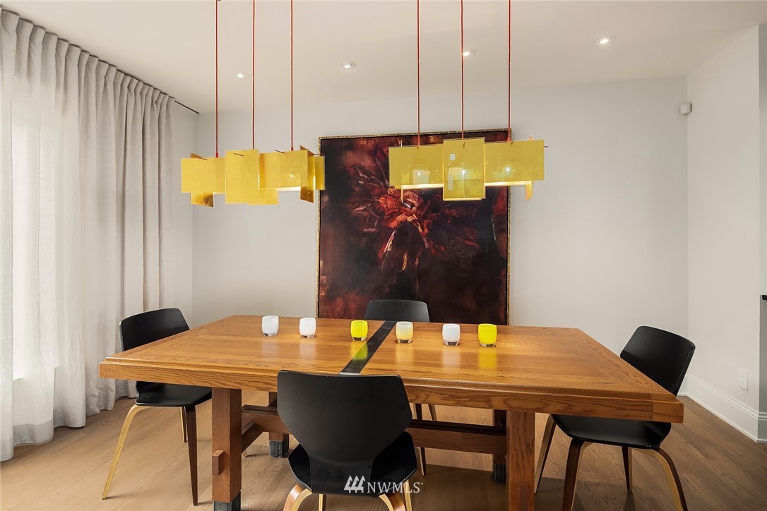 1618 37th Avenue Seattle, WA 98122 - Photo 11 of 39 a view of a dining room with furniture